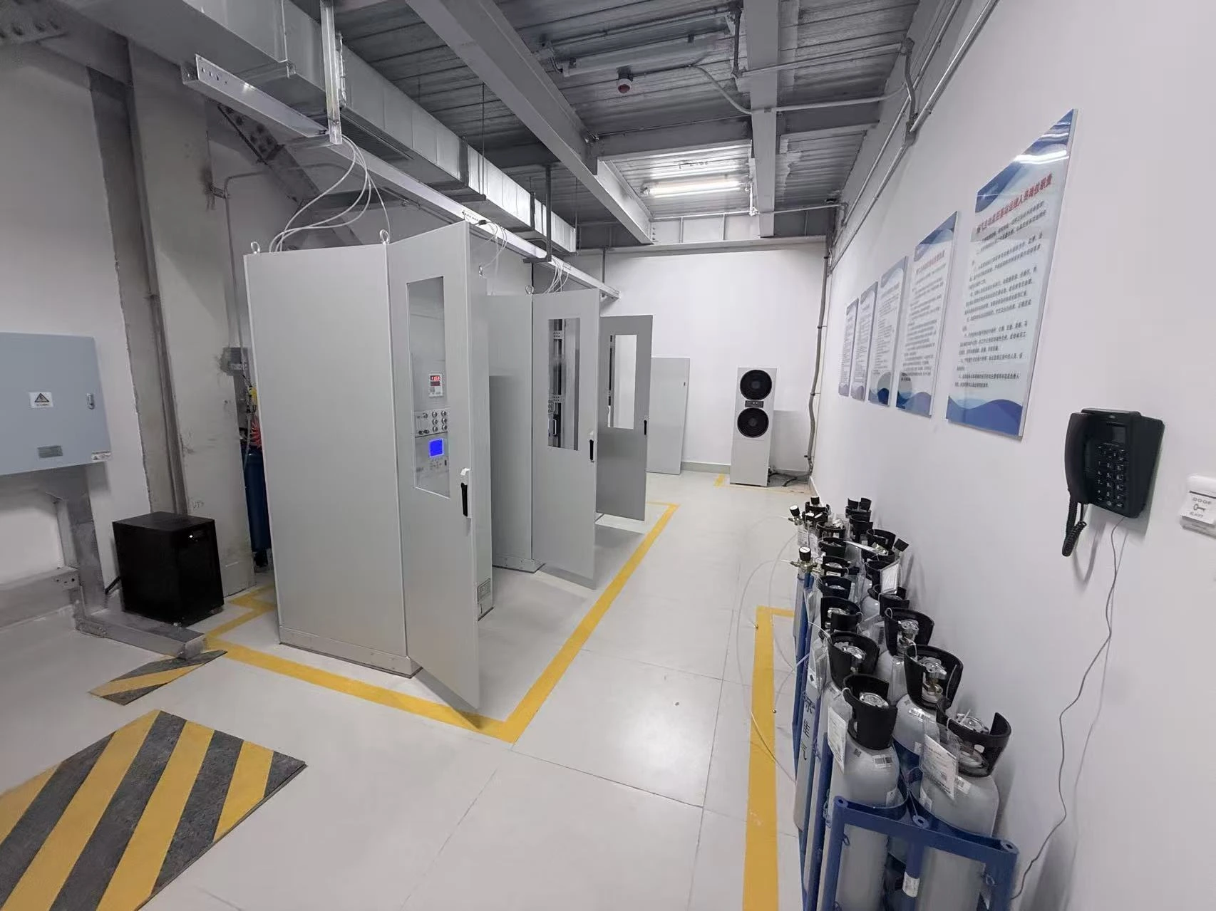 Customer photograph of installed analysis systems in a monitoring room